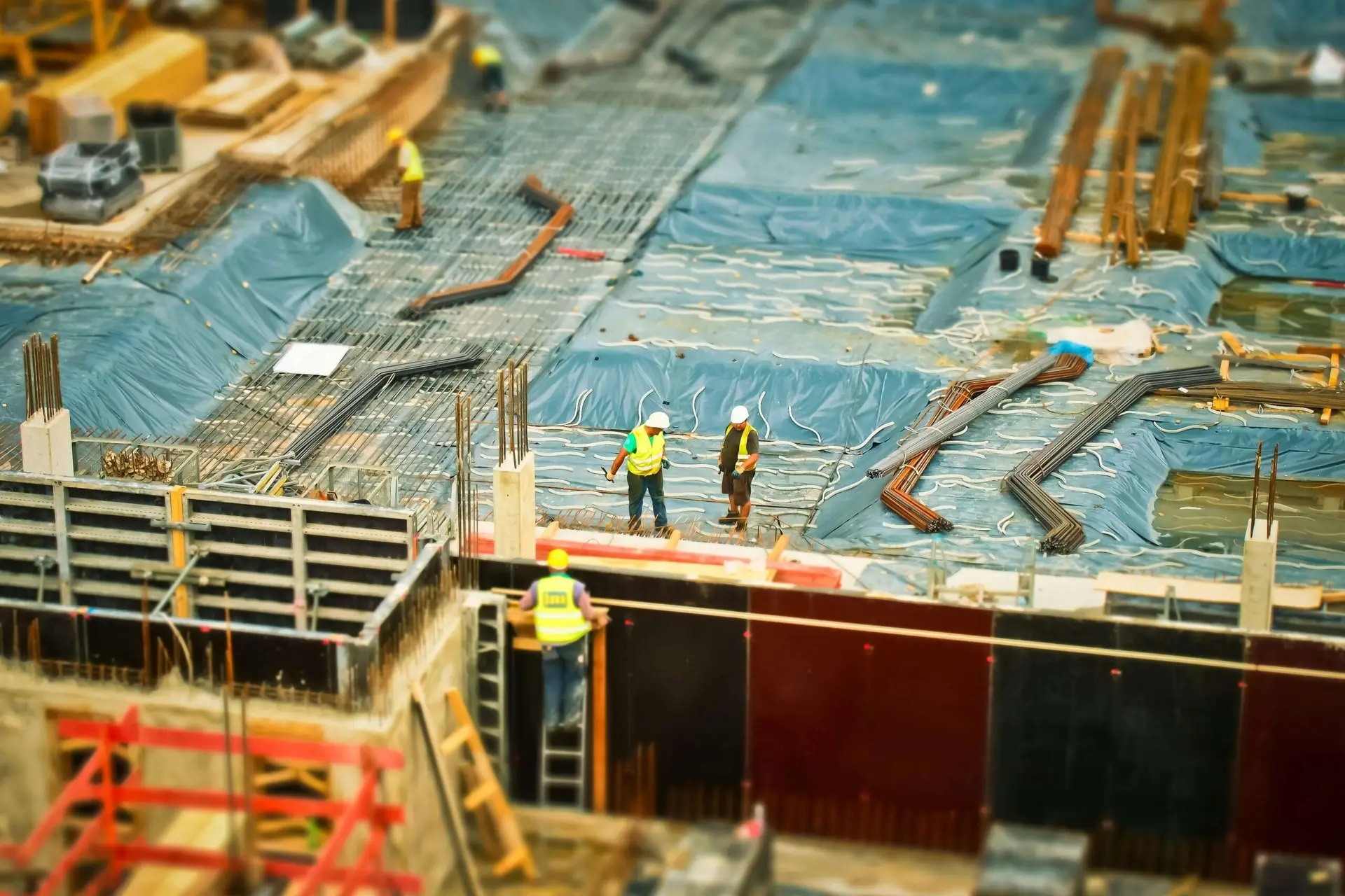 People in a construction site working